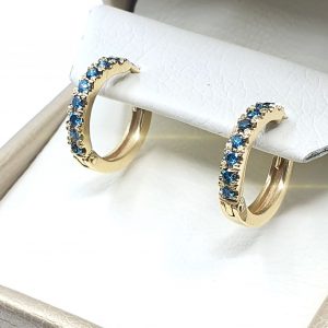 Candongas oro amarillo 18 k con diamante azul 0,16 ct peso total apox - hover
